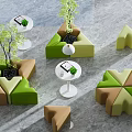 Modern Public Chairs With Green Brown Design Triangular Clover Shapes Small Tables And Plants