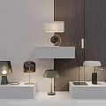 Modern Table Lamps with Various Designs on White Display Shelves in Modern Interior