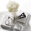 Modern Decorative Ornament Set With White Flower Bouquet Stacked Books And Sculptures For Home Decor