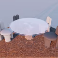Modern Round White Table With Gray And Beige Chairs On Brown Carpet