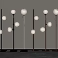 Modern Minimalist Floor Lamps With White Spherical Shades Black Gold Poles And Circular Bases