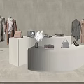 Decorative Accessory Set on Lighted Display Tables with Handbags and Clothes in Fashion Store
