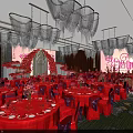 Elegant Red Theme Banquet Hall With Red Carpet Roses Chandeliers Tables And Stage Arch