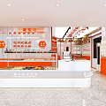 Dessert Shop Interior Design With Orange Walls White Display Counter And Fresh Dessert Displays