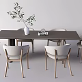 Modern Dark Dining Table Set With Light Gray Chairs Wooden Legs White Vase Green Plants