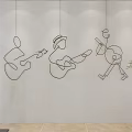 Modern Line Art Wall Decor Featuring Guitar Players with Silver Sculpture and Green Plant