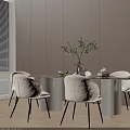Modern Dining Table Set with Cream Chairs Green Plant Vase and Books on Tabletop
