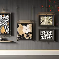 Abstract Paintings With Floral And Geometric Patterns Hanging On Gray Wall With Golden Frames