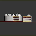 Layered White Cake With Red Cream And Sliced Piece On Decorative Plate