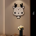 Cartoon Deer Shaped Wall Clock Hanging On Beige Wall With Flowers