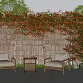 Lush Orange Flower Vines Covering Bamboo Fence With Outdoor Wooden Chairs And Table
