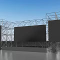 Metal Frame Stage With Three Large Black Screens And Blue Sky Background