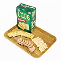 Club Original Crackers in Green Box on Wooden Tray with Round and Square Shapes