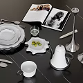 Ornament Decor Combination With White Ceramic Plates Silver Candlesticks Kettle And Open Book On Tabletop
