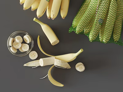 Fresh Yellow Bananas Peeled Sliced in Bowl and Mesh Bag with Green Bananas 3d model