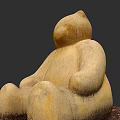 Wooden Bear Sculpture in Sitting Posture with Natural Texture and Wood Shavings