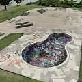 Outdoor Skate Park With Graffiti Bowl And Concrete Ramps For Fitness Activity