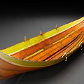Traditional Handcrafted Wooden Boat With Orange Yellow Hull Green Accent And Decorative Rivets