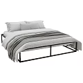 Modern Double Bed With Black Metal Frame Gray Striped Blanket And Pillows
