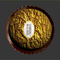 Golden Wrapped Round Chocolate in Brown Paper Cup with Shiny Surface