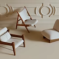 Modern Leisure Chairs With Wooden Frames And White Upholstery In Interior Setting