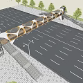 Pedestrian Bridge With Unique Circular Frame Over Parking Lot Featuring Street Lights And Trees