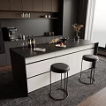 Modern Kitchen With Black Counter Island White Cabinets And Bar Stools