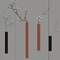 Modern Wall Decor With Black Orange Hanging Rods And White Flower Branches