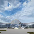 Contemporary Architectural Landmark With Curved Roof Glass Facade And Green Surroundings