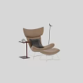 Leather Leisure Chair With Tan Upholstery Gray Cushion Red Side Table And Floor Lamp