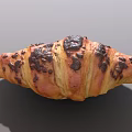 Freshly Baked Golden Brown Croissant With Buttery Layers And Crispy Texture