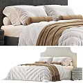 Cozy Bedroom Bed With White And Brown Bedding Soft Quilt Pillows And Headboard
