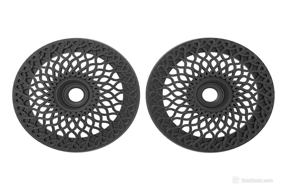 Two Black Circular Decorative Plates Featuring Intricate Carved Patterns For Home Decor 3d model 