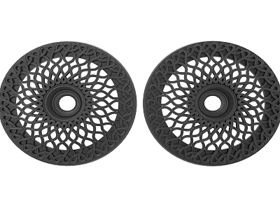 Two Black Circular Decorative Plates Featuring Intricate Carved Patterns For Home Decor 3d model