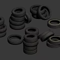 Various Stacked and Single Car Tires Arranged in Different Positions with Rubber Texture