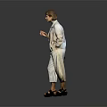 Woman In Light Gray Jumpsuit With Belt Holding Black Handbag Standing Against Dark Background