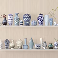 Decorative Ceramic Vessels with Blue and White Patterns Displayed on White Shelves for Home Decor