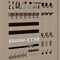 Various Wall Mounted Hooks With Different Designs On Wooden Display Board 3d model