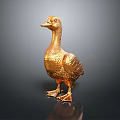 Golden Decorative Duck Figurine With Shiny Metallic Surface And Detailed Feathers