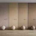 Hinged Doors In Various Wood Tones With Metal Handles And Decorative Balls On Wooden Floor