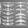 Various Ornate Carved Decorative Pieces With Floral And Circular Patterns