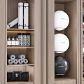 Organized Sports Equipment Storage Cabinet With Dumbbells Kettlebells Yoga Balls And Foam Rollers