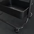 Three Tier Metal Utility Cart With Black Trays And Rolling Wheels
