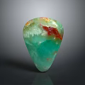 Polished Natural Wood Stone Teardrop Ornament With Green Red White Hues And Smooth Texture