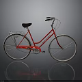 Red Classic Bicycle with Black Seat Silver Handlebars Shiny Fenders and Smooth Tires
