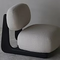 Modern Single Seater Sofa With Beige Fabric And Black Curved Frame Design