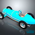 Blue Vintage Race Car With Open Top Streamlined Body And Spoked Wheels