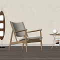 Modern Wooden Frame Leisure Chair with Light Fabric Seat and Floor Lamp in Minimalist Room