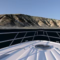 Natural Landscape With Mountain Ranges Coastal Shoreline And Dark Blue Water