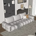 Modern Living Room Sofa Coffee Table Set with Cream Cushions Round Table and Decorative Items